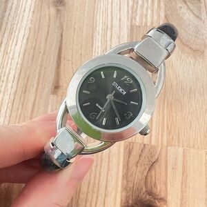 Studio time ladies silver tone black cuff bracelet watch NEW BATTERY
